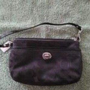 Coach large black front closure and zipper wristle